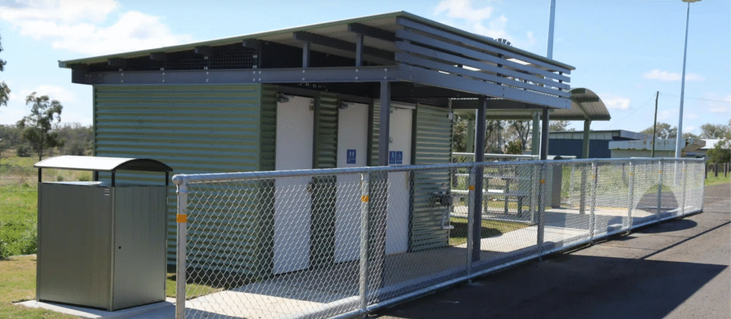 Queensland TMR roadside facility with two cubicles (accessible, ambulant), lockable storeroom, and level access.