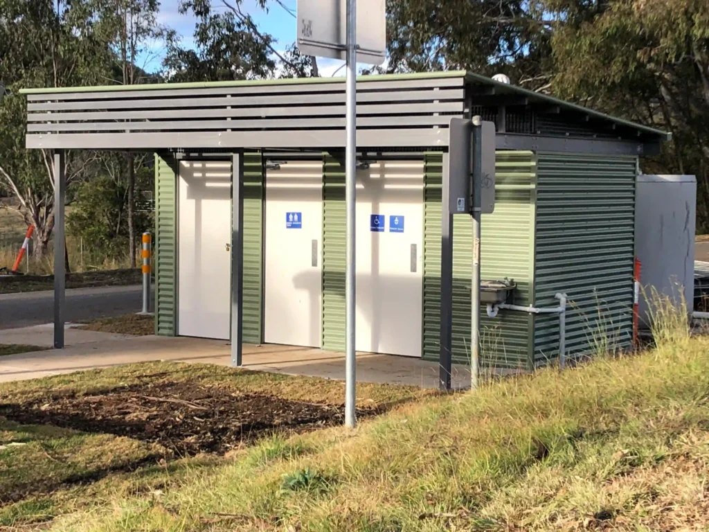 Queensland TMR restroom building with accessible cubicle, ambulant cubicle, and a lockable storage room.